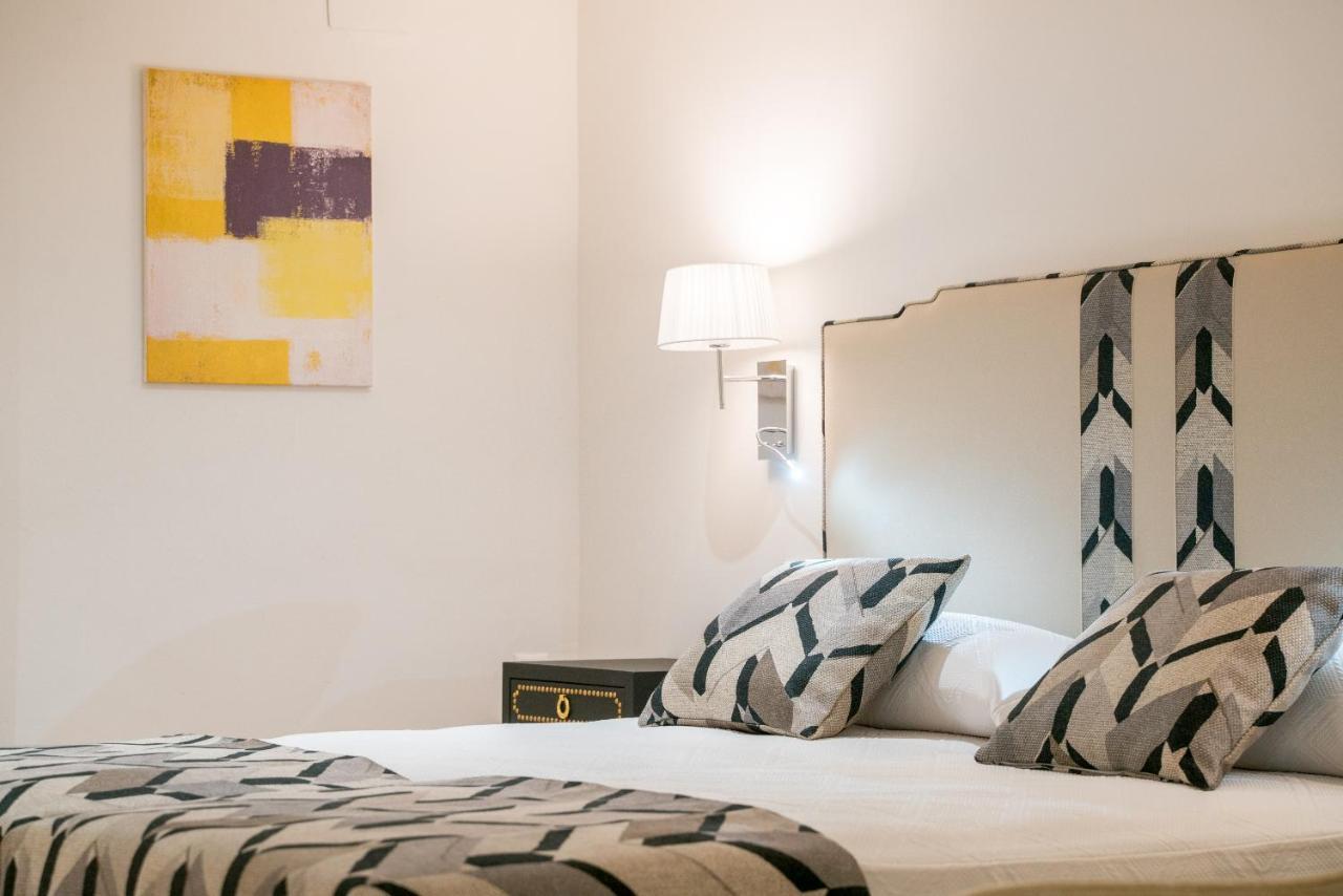 Aparthotel Arco Macarena Lofts à Séville Extérieur photo